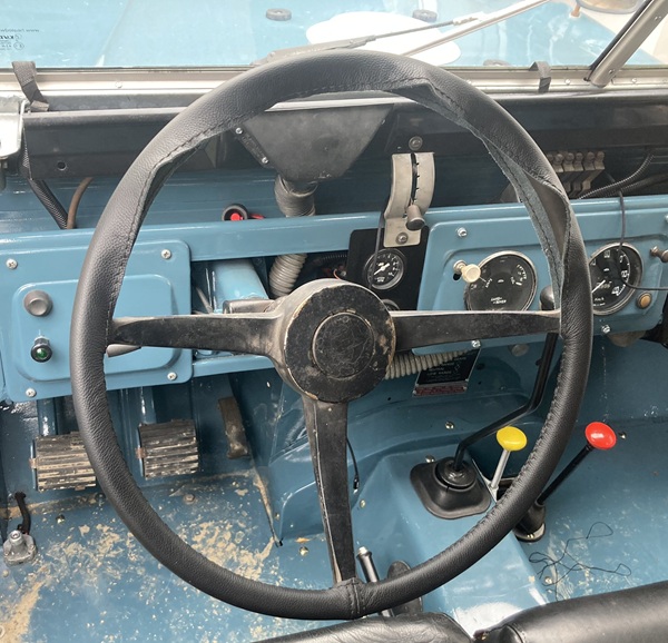 Steering wheel with leather cover.